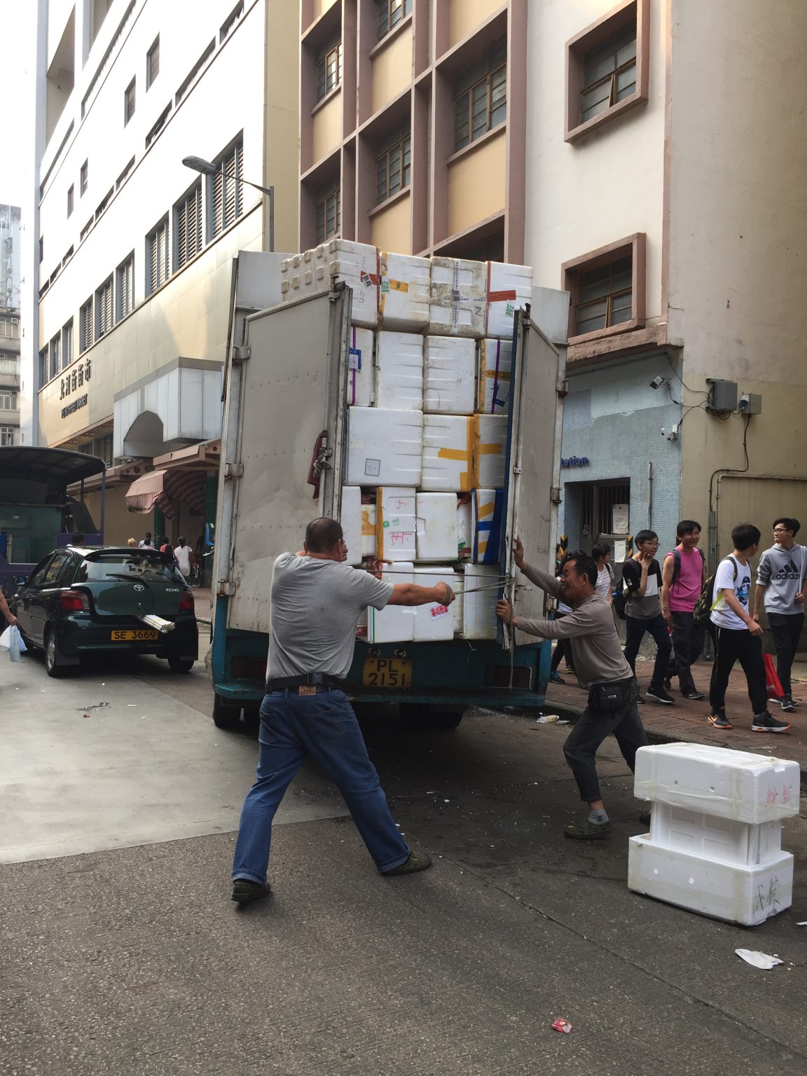 Hong Kong street photograph from STUDIO VOICE vol.414, showing a truck loaded with foam boxes.